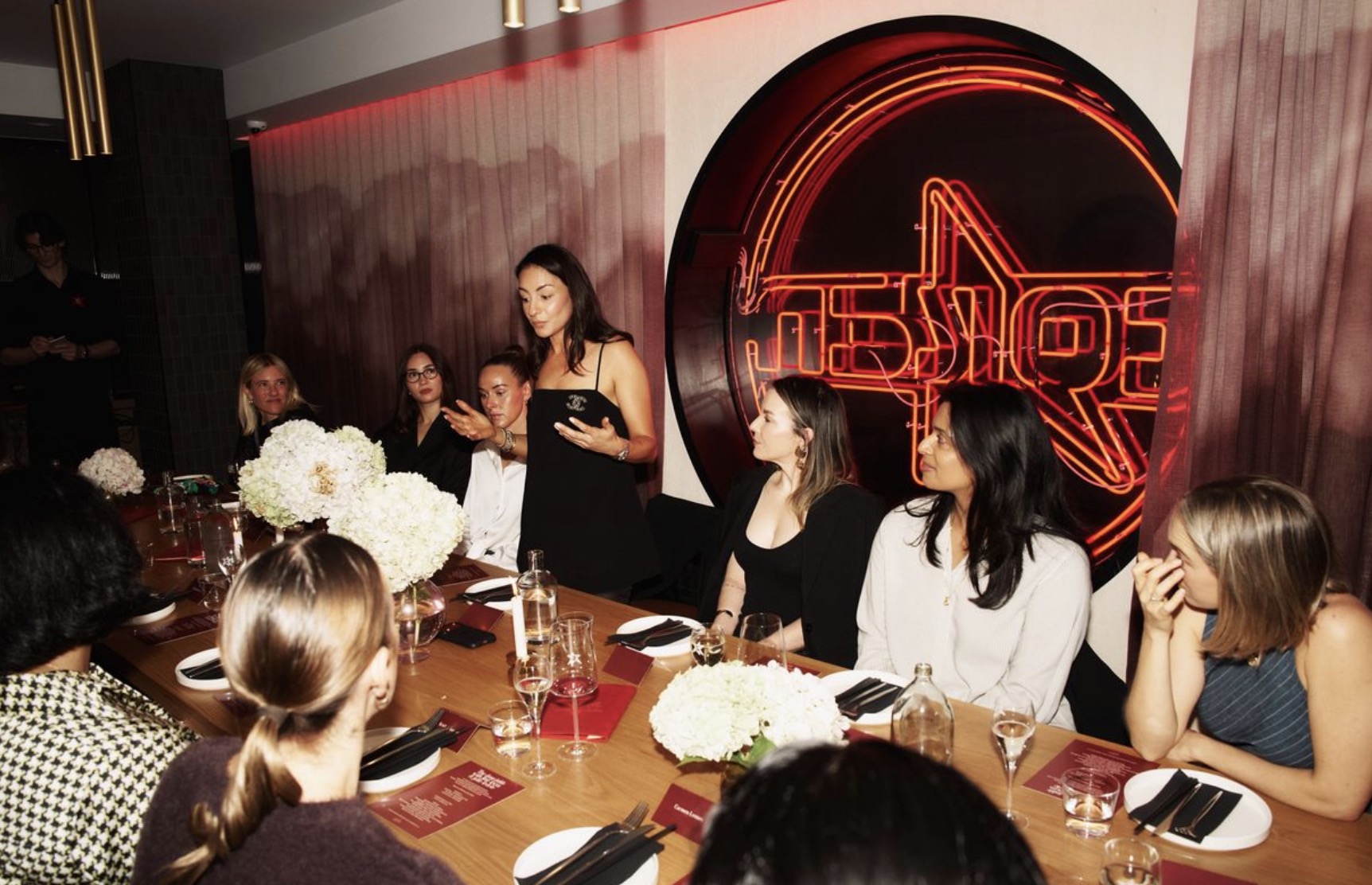 Women around the dinner table at an Off Script event